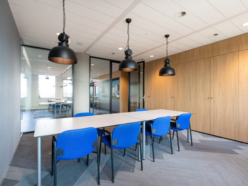 meeting room interior modern office with long wooden table chairs around it 181624 21722